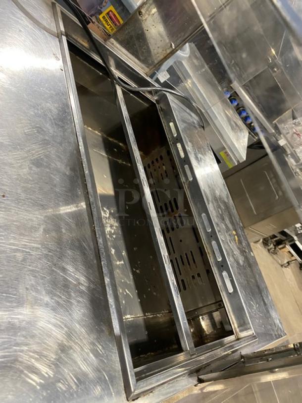 Turbo Air MST-28-N-711S stainless steel refrigerated prep table with sneeze guard and poly-coated wired rack. 115V, single phase.