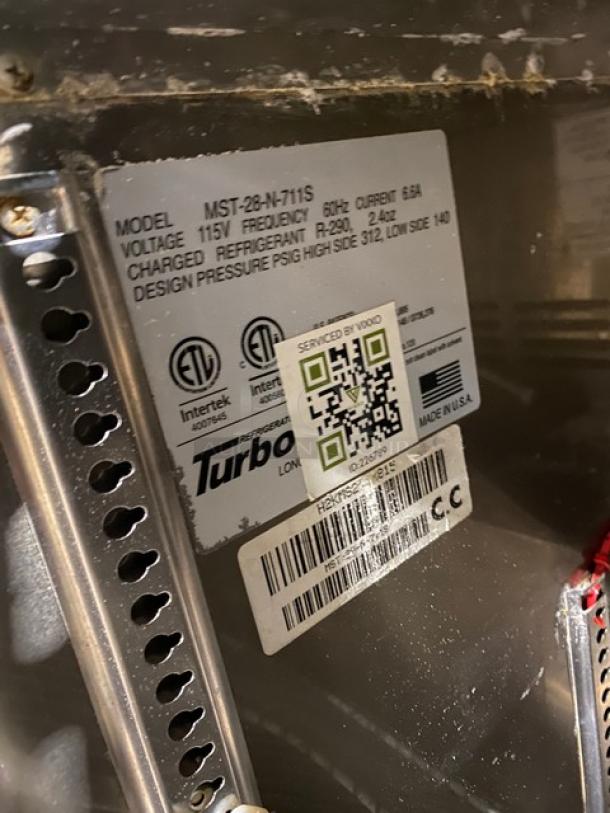 Turbo Air MST-28-N-711S label, detailing 115V, refrigerant R-290, design pressure, and service QR code.