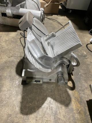 Hobart Commercial Electric Powered Countertop Medium Duty Angle Feed Deli Meat Slicer! Model: EDGE SN: 21-1005506! 120V 1 Phase! On Legs! - Item #1224096