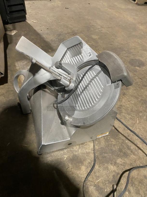 Hobart EDGE commercial electric deli meat slicer, model EDGE, SN: 21-1005506, 120V, 1 phase, medium duty, countertop.