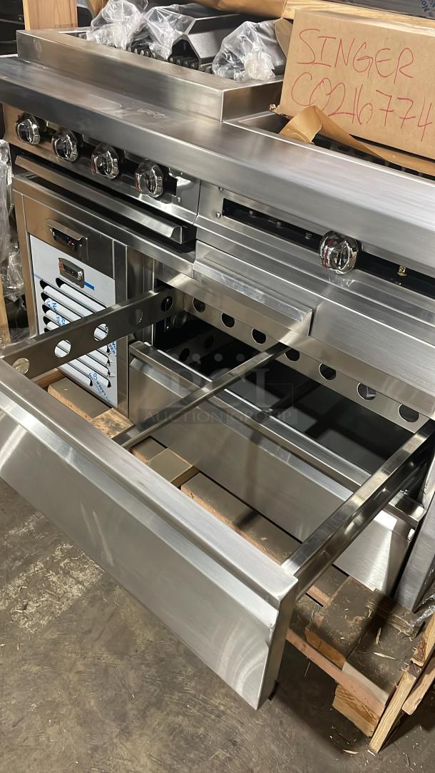 Brand new Jade Range Trio Combo Unit JURH-CHP; natural gas, 24" charbroil grill, 24" plancha, fridge base, on casters.