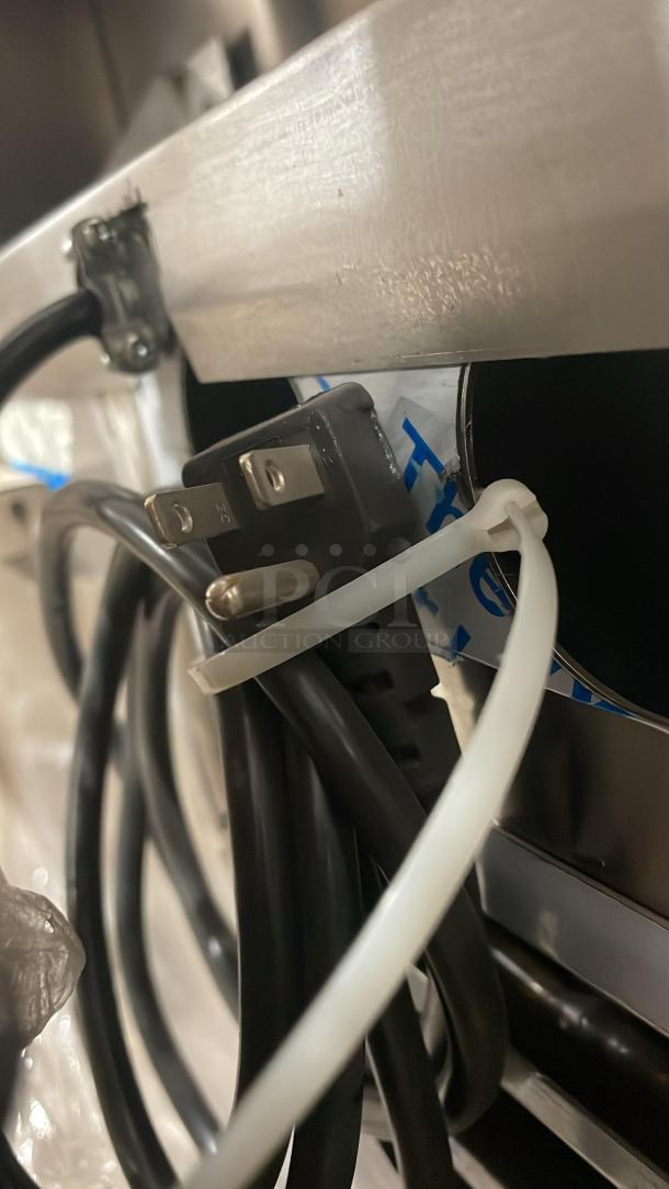 New Jade Range Trio Combo Unit power cord close-up. Features include char broil grill, flat plancha, chef base, stainless steel. Model JURH-CHP.