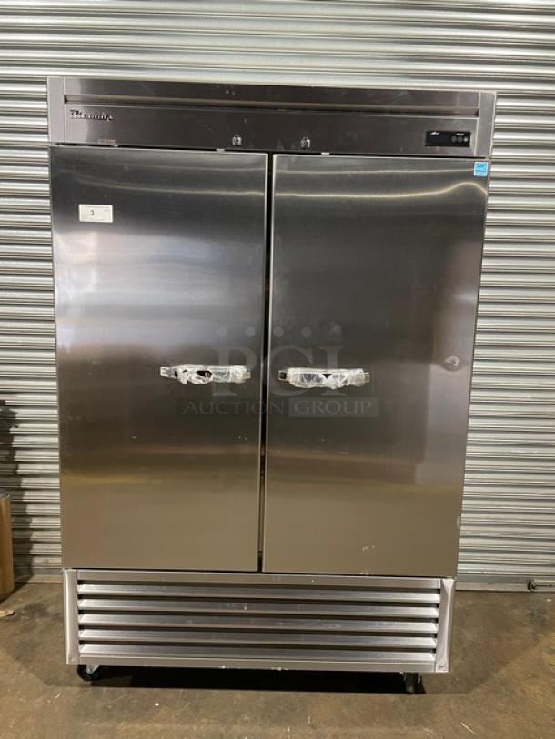 Blue Air BSF49-HC stainless steel reach-in freezer, dual solid doors, 115V, on casters, with minor scratches and dents.