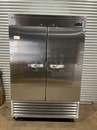 Blue Air BSF49-HC stainless steel reach-in freezer, dual solid doors, 115V, on casters, with minor scratches and dents.