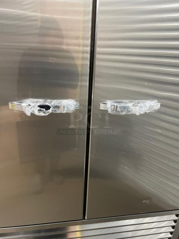 Blue Air Model BSF49-HC stainless steel reach-in freezer with two solid doors. New, scratch-n-dent condition. On casters.