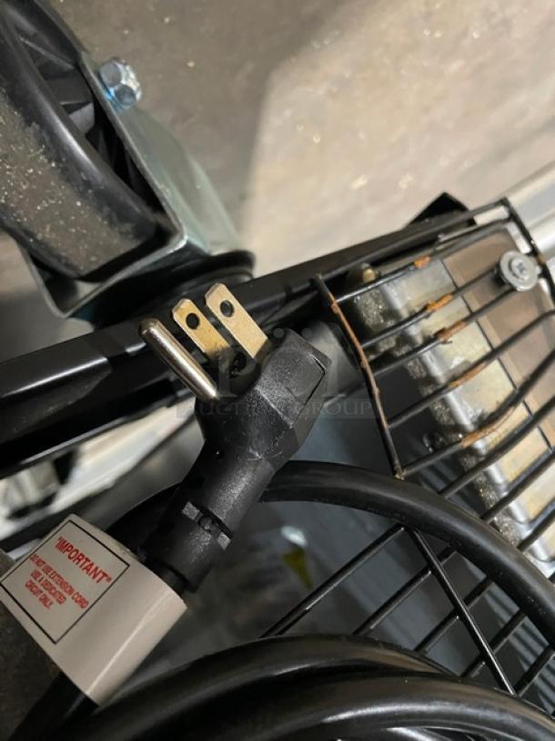 Blue Air BSF49-HC reach-in freezer plug and casters, showing sturdy construction. 115V 1 Phase. Serial BHC4A94T300070.