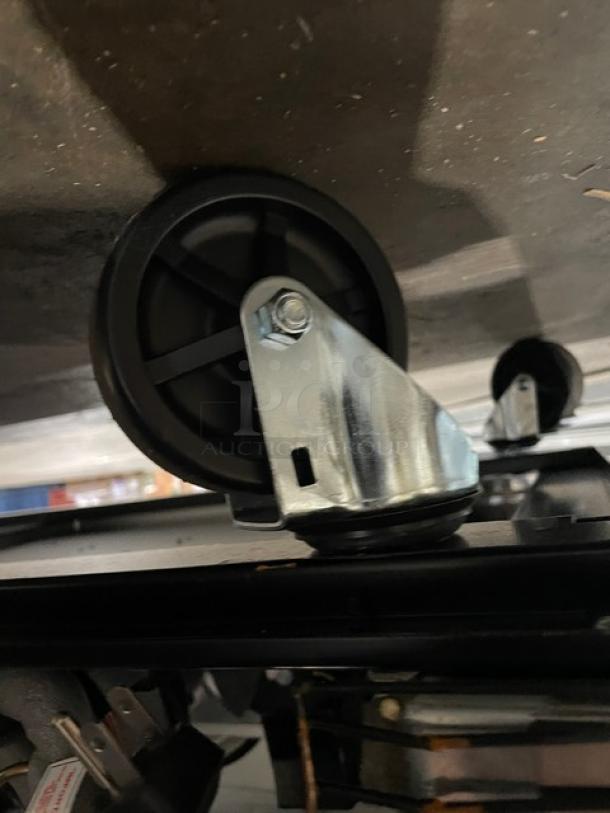 Blue Air 2 Solid Door Stainless Steel Reach-In Freezer wheel detail, Model BSF49-HC. In "scratch-n-dent" condition, on casters.