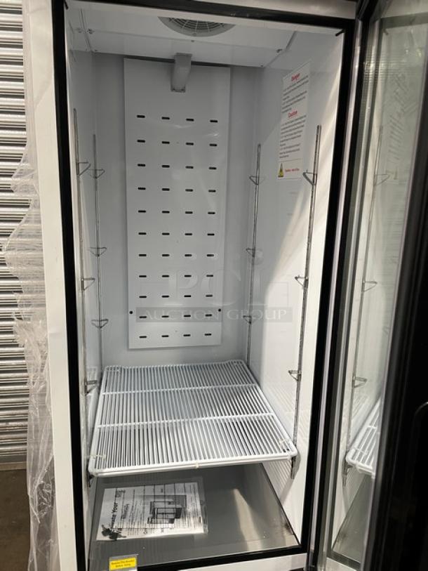 BLUE AIR BKGF23-HC glass door freezer, scratch-n-dent, on casters, 115V 1 Phase, shelves and interior visible, serial KGF23HCX010274.