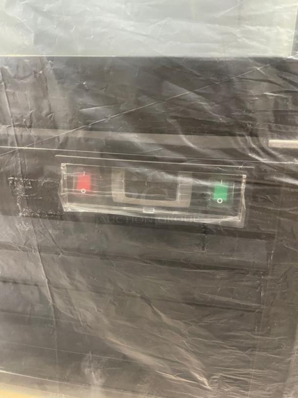 Blue Air BKGF23-HC glass door freezer merchandiser, new with minor scratches. Visible on/off switch, 115V, on casters.