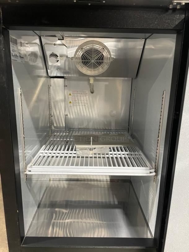 Blue Air BBB23-1B bar back cooler, scratch-n-dent, single door, stainless steel top, 115V, on casters, interior view.