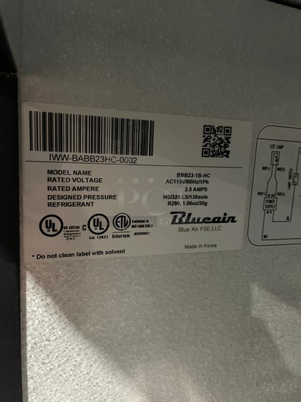 Blue Air one-door bar back cooler, Model BBB23-1B, scratch-n-dent, stainless steel worktop, on casters, 115V, serial IWWBABB23HC0002.