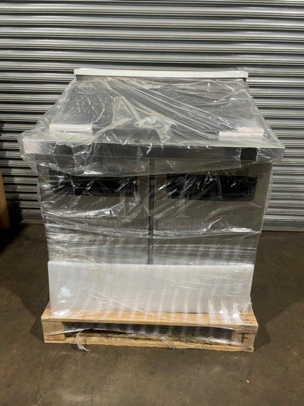 Brand new Blue Air 36" Refrigerated Mega Top Sandwich Prep Table, Model BLMT36, in box, wrapped, on castors, 115V.