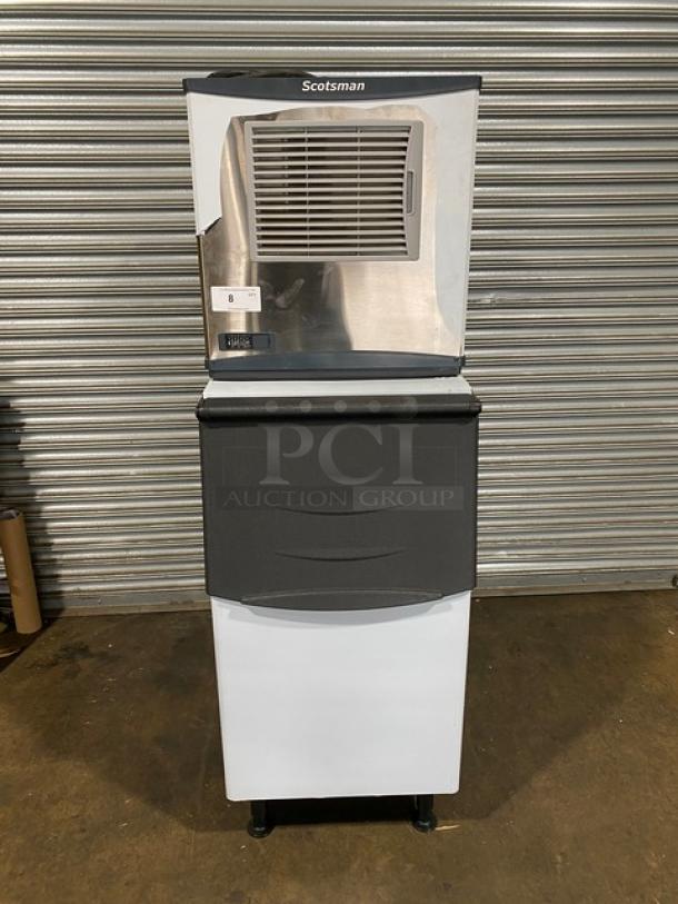 Scotsman NS0422A-1B Prodigy Plus nugget ice machine, new, 420 lbs capacity, on new ice bin, air-cooled, 115V, on legs.