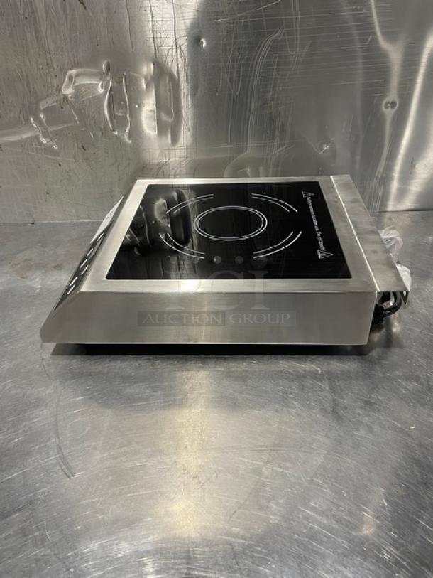 New 2015 Adcraft INDB120V induction cooker, stainless steel, single burner, commercial countertop model, serial 12150270.
