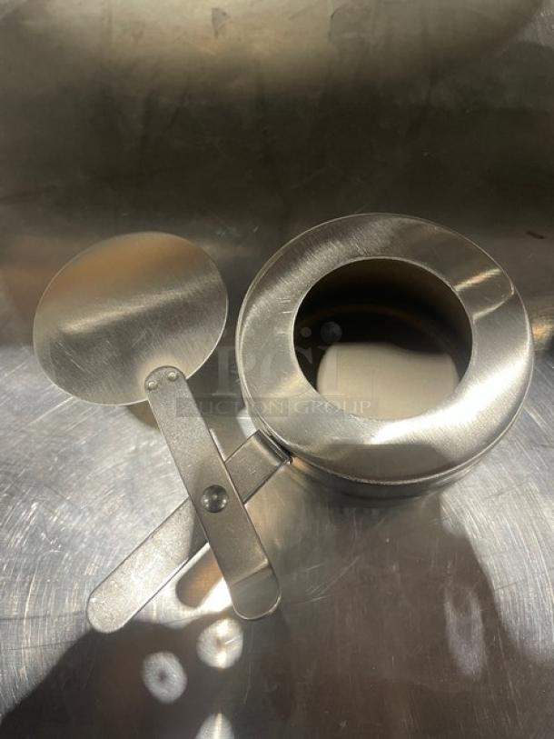 Stainless steel chafing dish with drop-in pan, new condition. Features sturdy handles, ideal for buffet use.