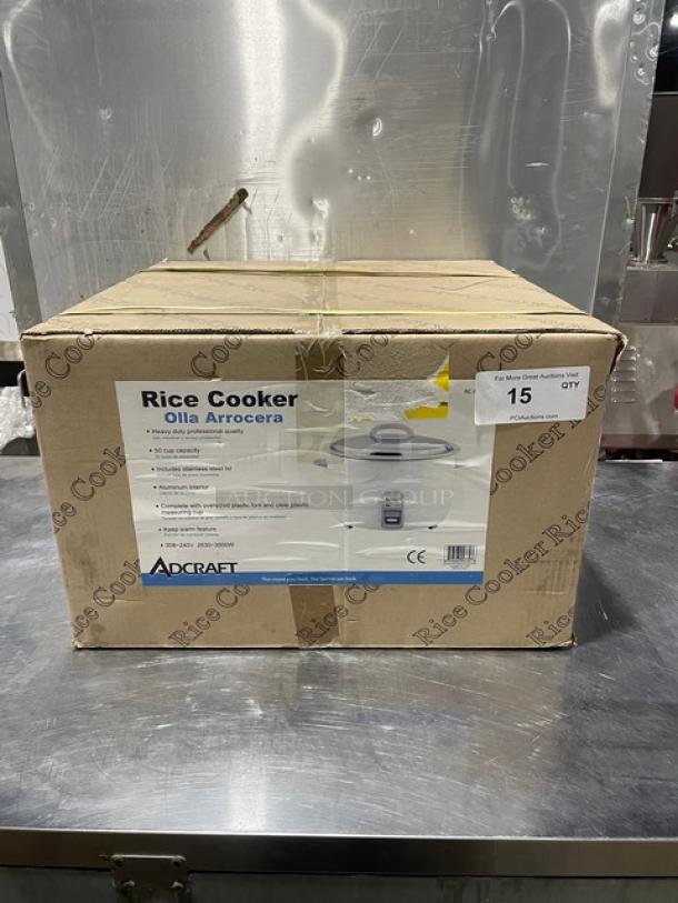 Brand new Adcraft countertop 50-cup rice cooker in box. Features stainless steel lid, aluminum interior, 208/240V.