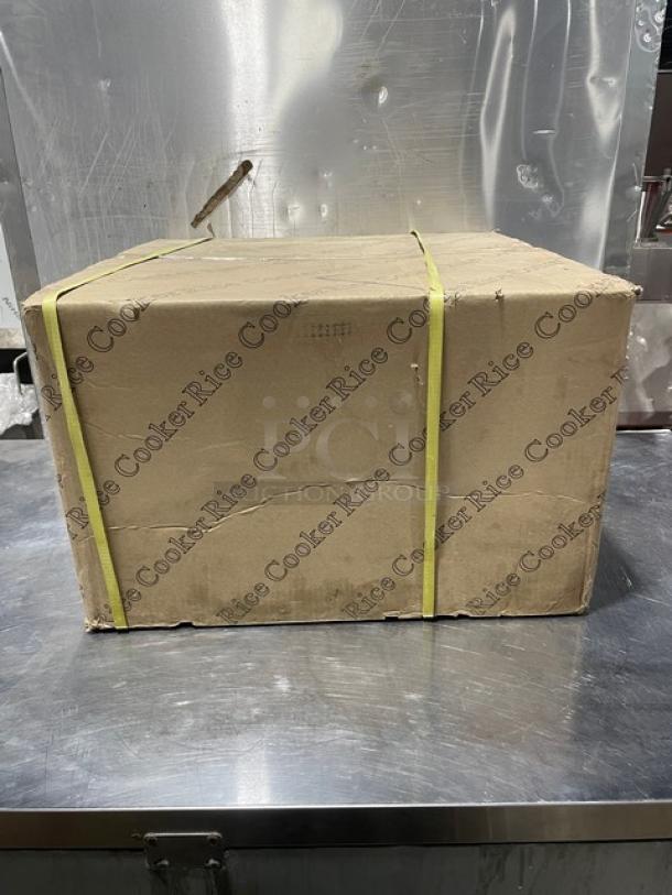 Brand new boxed Adcraft 50-cup rice cooker/warmer, with stainless lid, aluminum interior, 208/240V.