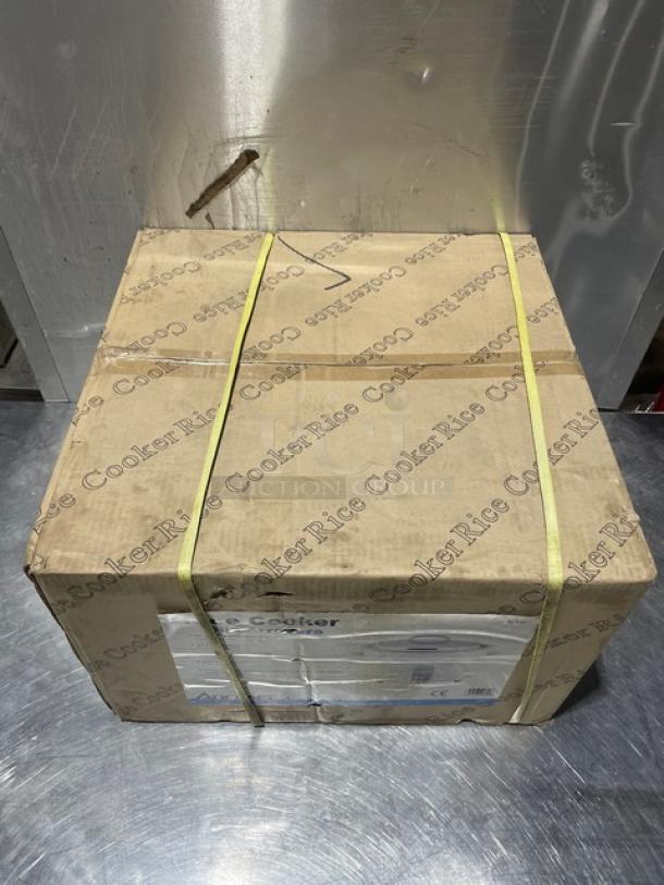 Brand new Adcraft Countertop 50 Cup Rice Cooker/Warmer in box. Features stainless steel lid, aluminum interior, 208/240V.