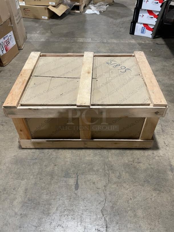 New Adcraft SG-813 Dual Panini Press in crate. Stainless steel body, cast iron grooved plates, separate temperature controls, 120V.