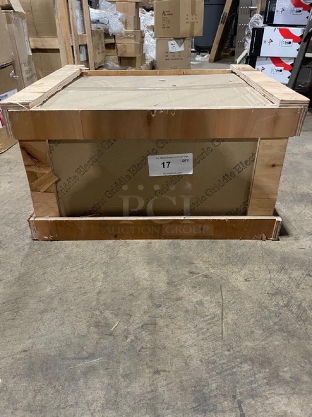 New Adcraft 16" stainless steel countertop electric griddle in original crate with back and side splashes, model number visible.