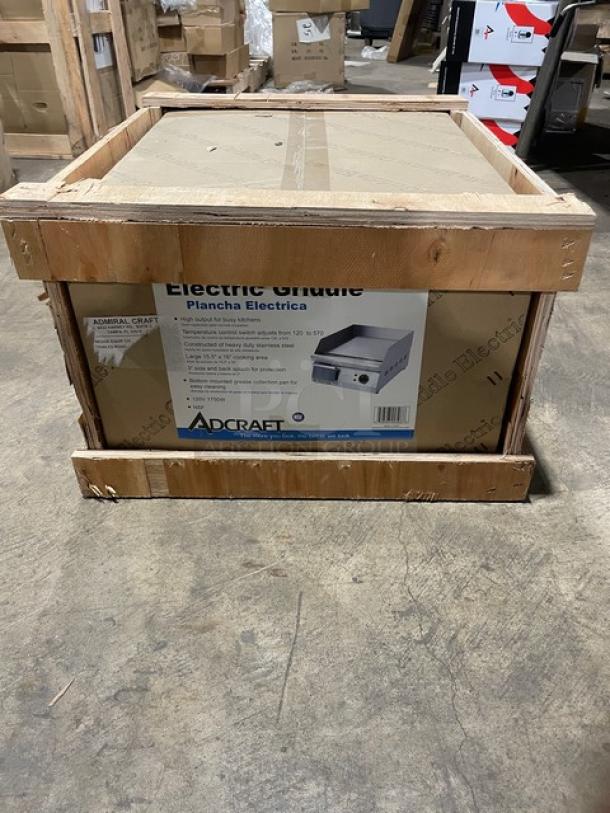 Adcraft commercial 16" electric griddle in original crate, stainless steel with back and side splashes, 120V, new condition.
