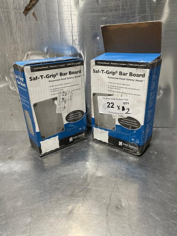 San Jamar Saf-T-Grip Bar Boards, new in box, with integrated anti-slip grips. Two boxes shown, each with labels.