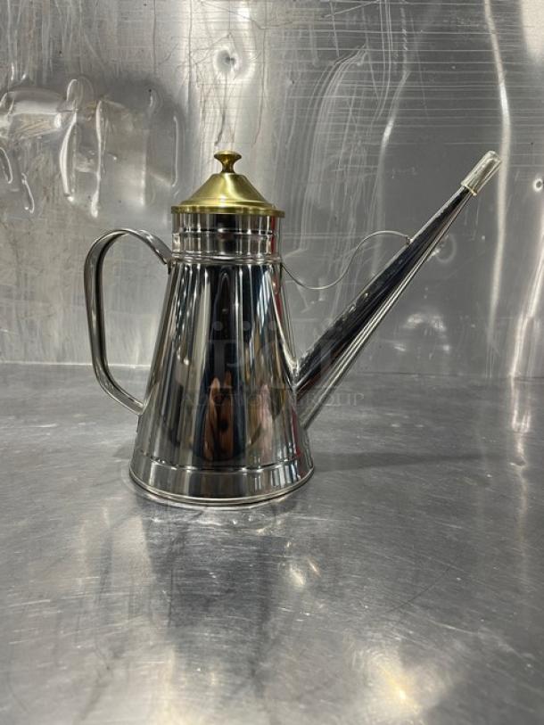 Adcraft OC-24 stainless steel oil can, brand new in box, featuring sleek spout and handle, with gold-tone lid.