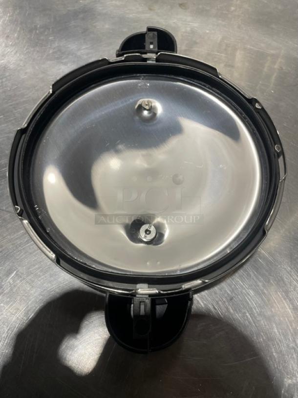 Sitram 13L Pressure Cooker, new condition, with lid and handles, Sitramax Series, stainless steel finish.