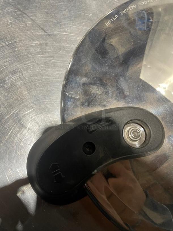 Sitram 13L pressure cooker lid with handle, Sitramax series, brand marking visible, new condition.