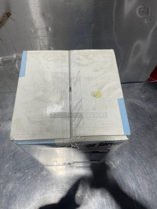 New Adcraft 10 Quart Insulated Beverage Server, Model BDI-10, in box. Stainless steel body, carry handle included.