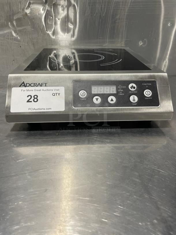 Adcraft INDB120V induction cooker, stainless steel, new condition, digital controls, model and serial numbers displayed.
