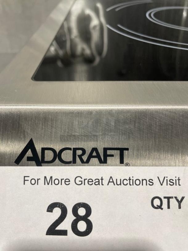 Adcraft INDB120V induction cooker, stainless steel body, new condition, model and serial number visible on label.