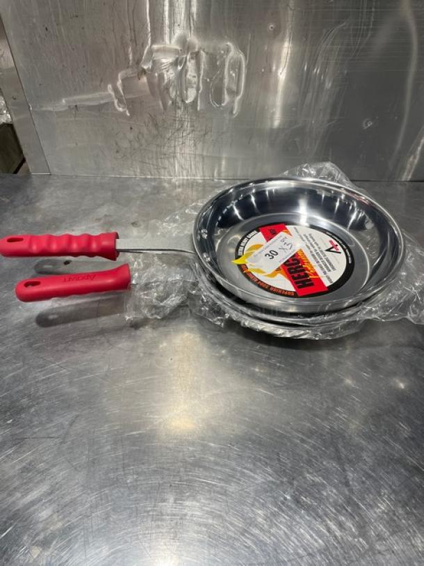 Adcraft Aluminum Frying Pan, Model HER-12FP/4, new condition, with red rubber grip handle, visible label inside.