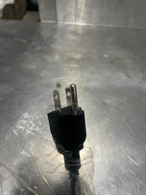 Adcraft FW-1200WR/B 11 Quart Cooker/Warmer, new, stainless steel interior, 120V power plug visible in packaging.