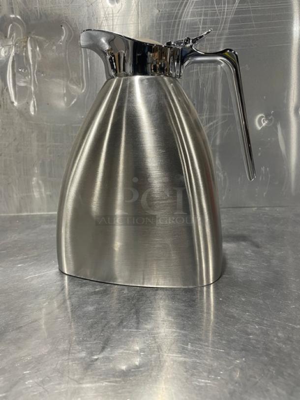 Spring insulated 1-liter beverage server, Model 17600-5, stainless steel, new condition, features sleek design and durable build.