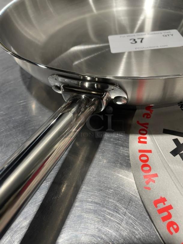 Adcraft Titan Series 12" Frying Pan, Model FPSI-12, all stainless steel, new condition, with visible auction tag.