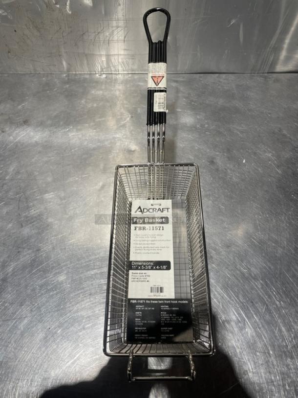 NEW Adcraft frying basket, model FBR-11571, new condition. Features wire mesh, heat-resistant handle, and attached label.
