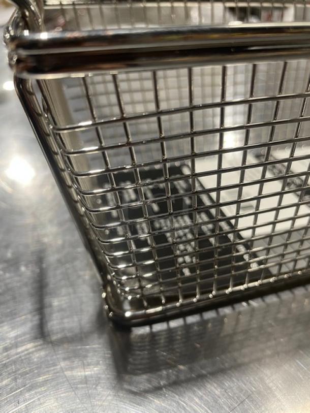 Alt text: Adcraft Frying Basket model FBR-11571, new condition, stainless steel wire mesh, corner view.