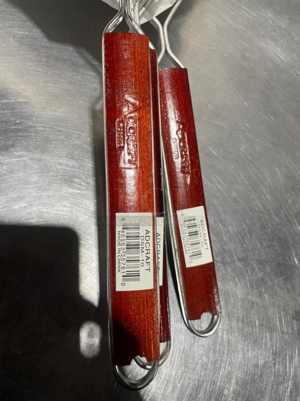 Adcraft Deluxe 10" Double Mesh Strainer DSM-10, new condition. Features wooden handles with brand and model tags.