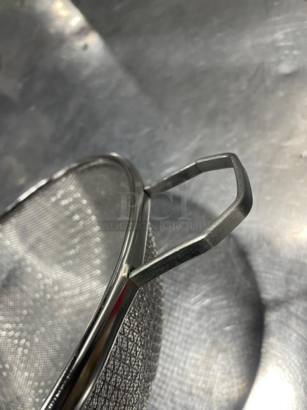 Adcraft DSM-10 10" double mesh strainer, new condition, durable stainless steel construction, ergonomic handle.