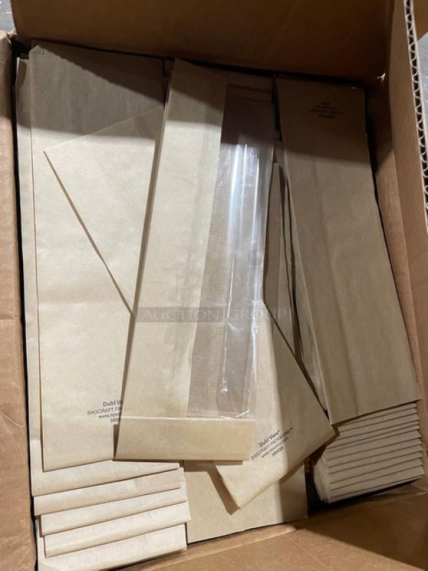 Box of Bagcraft Model 300050 natural kraft paper deli bags with clear window. Brand new, 500 per case.