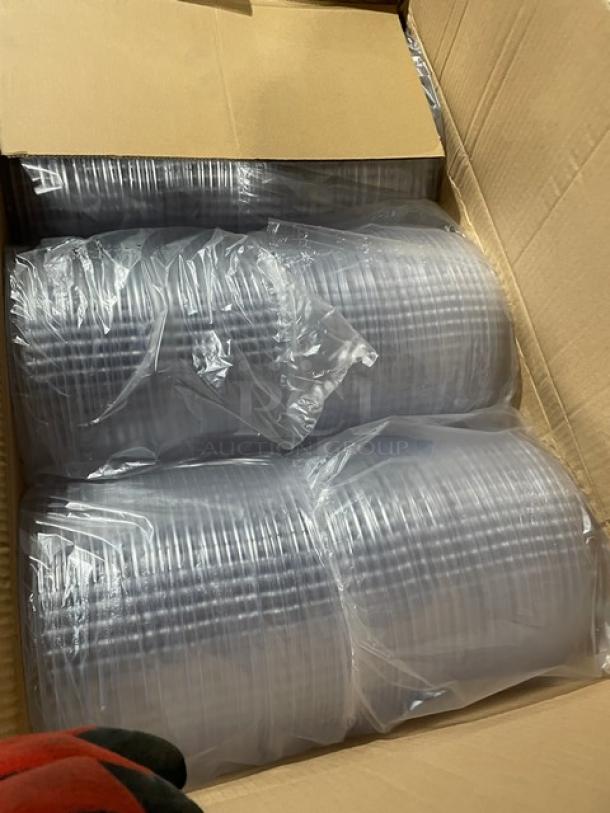 Box of new clear lids, model FP-PSBL203-OPS, in plastic wrap, part of mixed pallet auction lot.