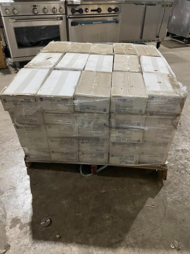 Full pallet of Hoffmaster Model 112002 ivory white 54"x108" rectangular plastic table covers, new condition, bulk packaging.