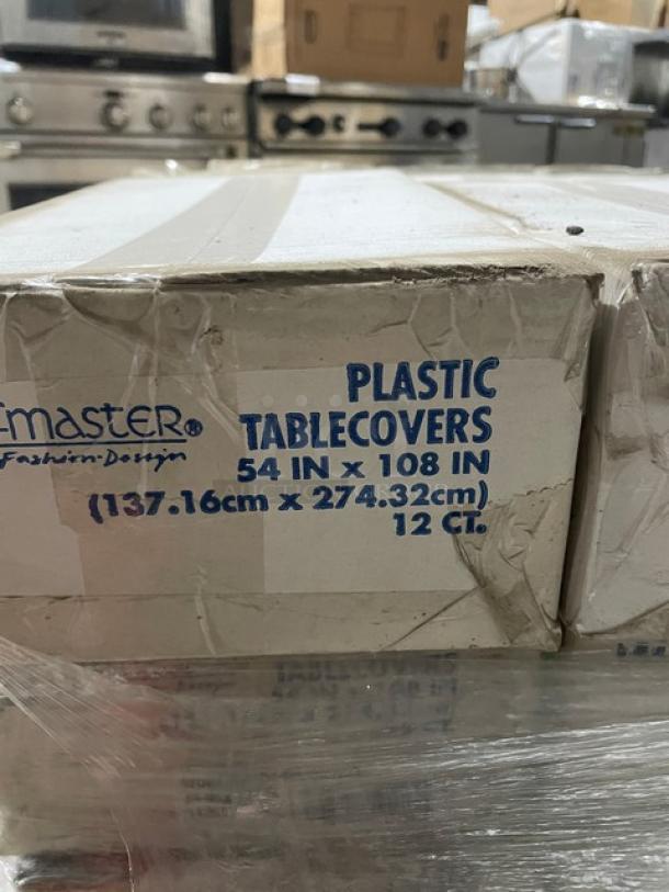 Hoffmaster model 112002 ivory white rectangular plastic table cover, size 54"x108", full pallet, brand new in box.