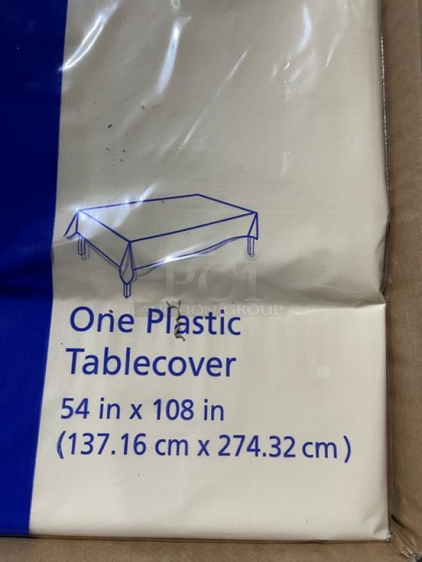 Brand new Hoffmaster ivory white rectangular plastic table cover, model 112002, 54"x108", shown in packaging.