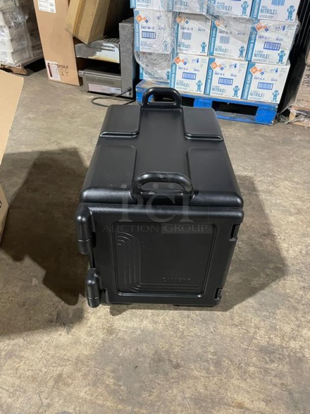 Brand new Cambro Ultra Camcarrier black insulated food pan carrier with front-loading design.