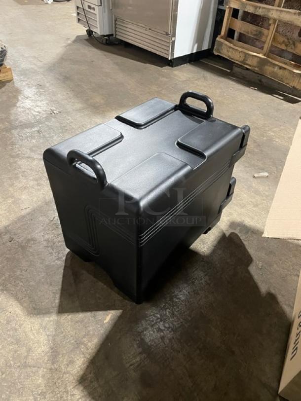Brand new Cambro Ultra Camcarrier black insulated hot box, front-loading, durable design, handles for easy transport.