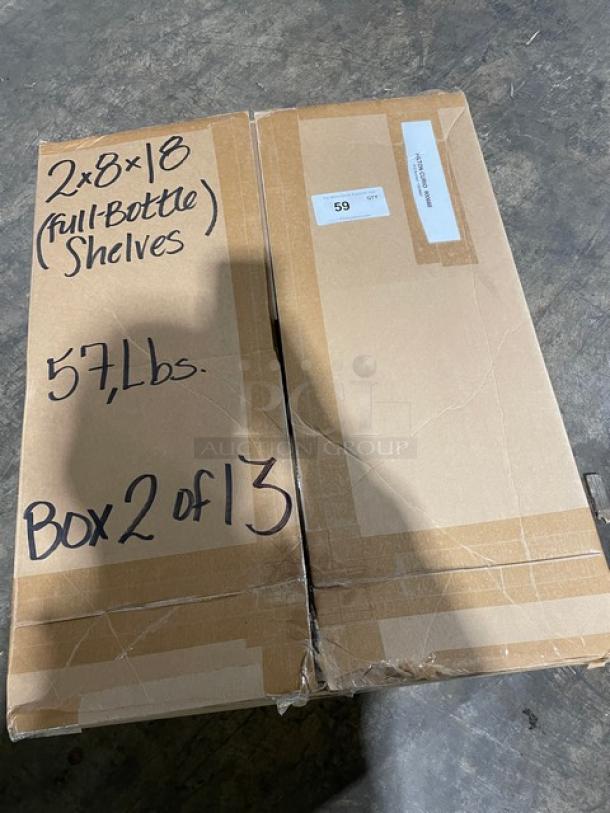 Brand new WineRacks By Marcus commercial wine rack. Box labeled "2x8x18 full-bottle shelves," 57 lbs, Box 2 of 13.