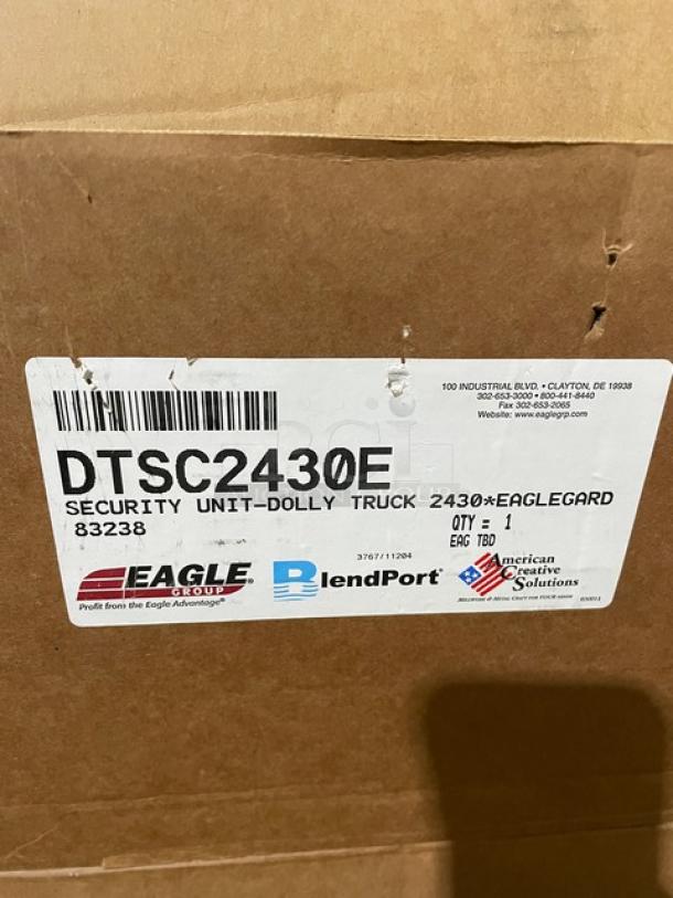 Brand new Eagle Group DTSC2430E green epoxy coated wired security unit with dolly truck, label visible.