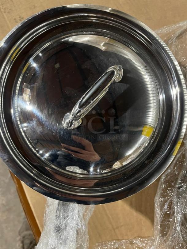 Brand new Mauviel M'Cook 5-ply stainless steel saucepan with lid and cast handle, polished finish.